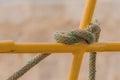 Old rope tied to a knot Royalty Free Stock Photo