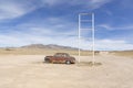 Old rotten vintage car at a patrol station in the desert at Route 895 at Rachel, Alamo, Nevada