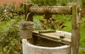 Old rotten water well, rural scenery Royalty Free Stock Photo