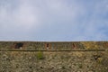 Old rough brick wall background texture. Ancient medieval wall Royalty Free Stock Photo