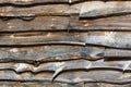 Old rough edge wood boards used as barn siding in the early morning light