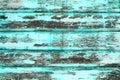 Old rough wood pieces texture surface background and aqua color abrasions