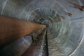 Old round dirty underground technical tunnel of heating duct with rusty pipeline Royalty Free Stock Photo