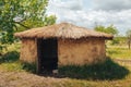 Old round house with thatched roof Royalty Free Stock Photo
