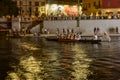 Old row boat at Darsena at night life time , Milan, Italy