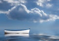 Old rowing boat marooned at sea