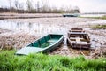 Old rowing wooden boats at lake. Beautiful nature landscape. Nature reserve.  Spring day Royalty Free Stock Photo