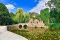 Old ruin called `Kirchenruine zum heiligen Grab` in front of pond in public park called `SchÃÂ¶ntal` in German city Aschaffenburg Royalty Free Stock Photo