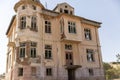 Old ruined abandoned yellow and highrise building in Ankara Turkey