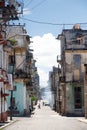 Old ruined balconies and facades on the street in historical center of Havana, Cuba