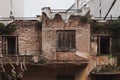 Old ruined brick house in the city. Royalty Free Stock Photo