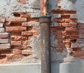 Old ruined brick wall with gutter Royalty Free Stock Photo
