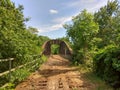 Old ruined bridge heading into the forest