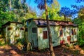 Old ruined cabins in the wood Royalty Free Stock Photo