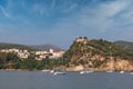 Old ruined castle on hill and Parga town Royalty Free Stock Photo