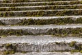 an old ruined concrete and stone staircase in the park Royalty Free Stock Photo