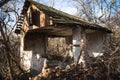 Old ruined house, not suitable for living, fallen brick wall Royalty Free Stock Photo