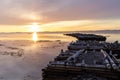 Old ruined pier in the sea in the early morning on a colorful sunrise over the White Sea Royalty Free Stock Photo