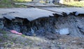 Old ruined road with asphalt surface