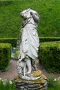 Zolochiv, Ukraine - May 2 2017: Old ruined statue of women without head in the garden of the castle in Zolochiv, Ukraine
