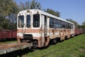 Old ruined steel passenger car. Rusty train on railway tracks Royalty Free Stock Photo