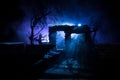 Old ruined stone house in deserted garden at night. Selective focus Royalty Free Stock Photo