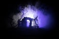 Old ruined stone house in deserted garden at night. Selective focus Royalty Free Stock Photo