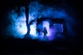 Old ruined stone house in deserted garden at night. Selective focus Royalty Free Stock Photo