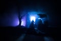 Old ruined stone house in deserted garden at night. Selective focus Royalty Free Stock Photo