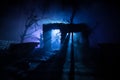 Old ruined stone house in deserted garden at night. Selective focus Royalty Free Stock Photo