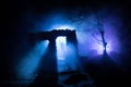 Old ruined stone house in deserted garden at night. Selective focus Royalty Free Stock Photo