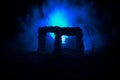 Old ruined stone house in deserted garden at night. Selective focus Royalty Free Stock Photo