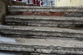 Old ruined stone staircase with garbage in winter Royalty Free Stock Photo