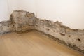 Old ruined wall in old apartment with preparation for repair
