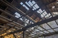 Old ruined warehouse that was almost demolished. The sky can be seen through the roof. Royalty Free Stock Photo