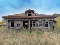Old ruined wooden house in an abandoned village Royalty Free Stock Photo