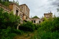 Old ruins of historical mansion Lopandino, Bryansk oblast, overgrown by vegetation green post-apocalyptic concept