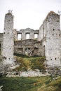 Old ruins of Skala Podilskyi castle, Ukraine. Destroyed ruined stone walls of medieval castle and green grass, historical defence Royalty Free Stock Photo