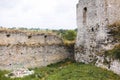 Old ruins of Skala Podilskyi castle, Ukraine. Destroyed ruined stone walls of medieval castle and green grass, historical defence Royalty Free Stock Photo