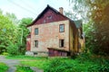 old run down beaten house that is in need of repair, concept of housing problems