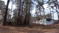 Old run down dilapidated trailer park close to woods