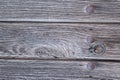 Old run-down wooden door and doorknocker