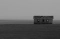 Old, rundown, abandoned cabin on the prairie of South Dakota in Black and White
