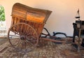 Old rural carriage in a typical Andalusian cortijo farmhouse located in the fertile farmlands near the city of S