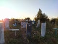 Old rural cemetery at sunset