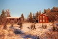 Old rural farmhouses in northern Sweden during winter sunset Royalty Free Stock Photo