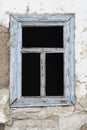 Old rural house window with broken glass, abandoned house Royalty Free Stock Photo