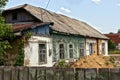 Old rural house with windows and slate roof on a sunny day Royalty Free Stock Photo