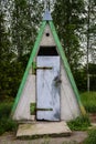 Old rural toilet triangle outhouse