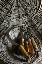 Old rural tools on a wicker basket